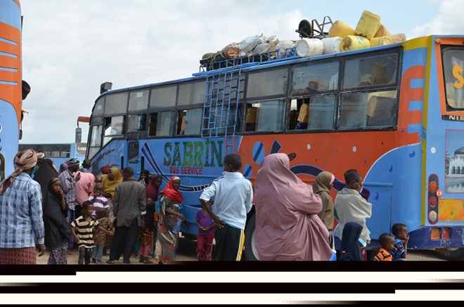 In mid-June, six buses carrying more than 387 people departed Dadaab camp in North-eastern Kenya travelled into Somalia. UNHCR assists returning refugees with cash grants, core relief items, food and other community-based support programs. Photo: UNHCR/Assadullah Nasrullah
